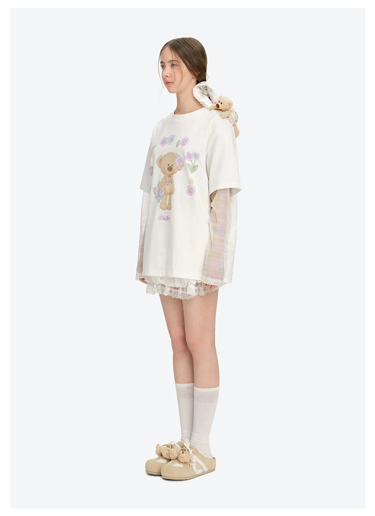 ホワイトの花柄フェイクツーピース長袖Tシャツ