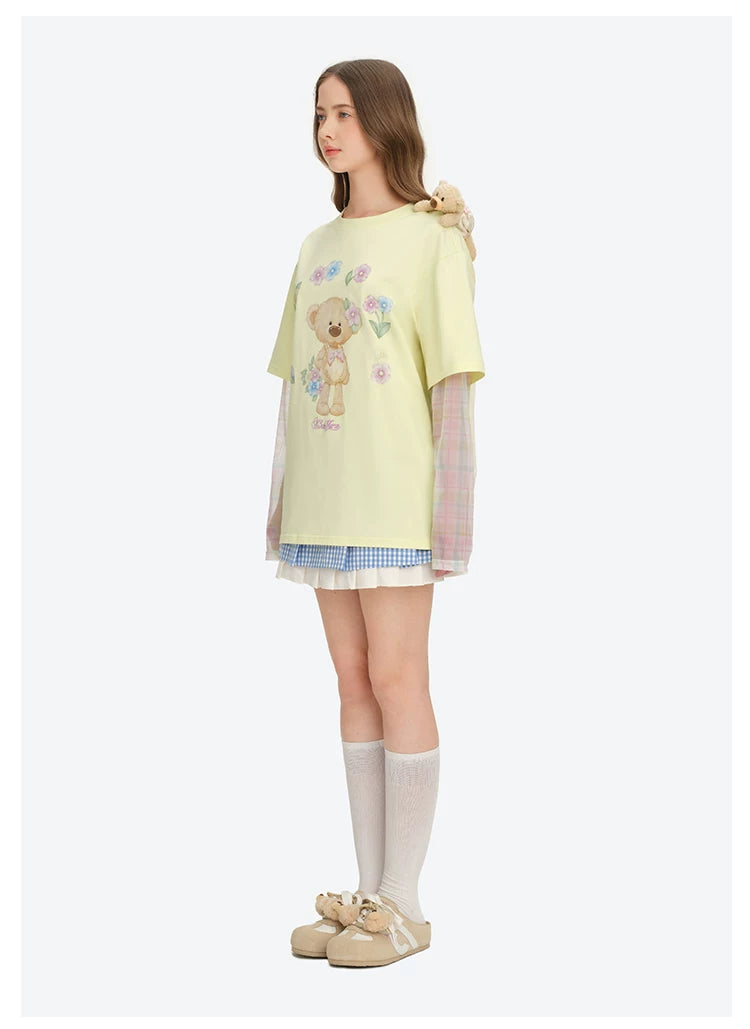 黄色の花柄フェイクデニムの長袖Tシャツ