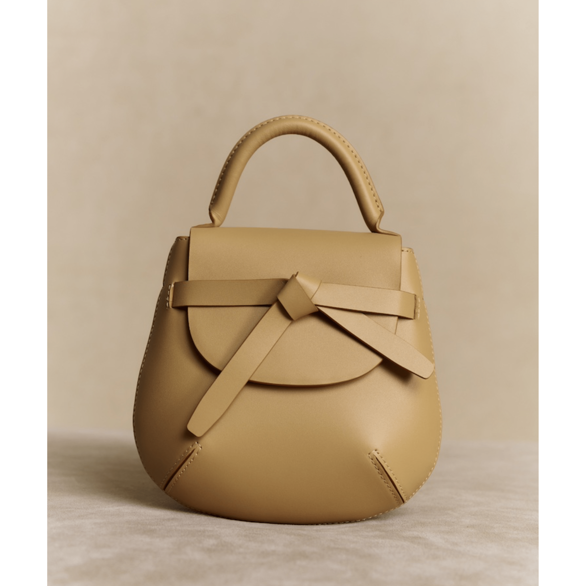 The Yellow Shop Beth Knotted Small Saddle Bag in Cream Apricot | MADAX