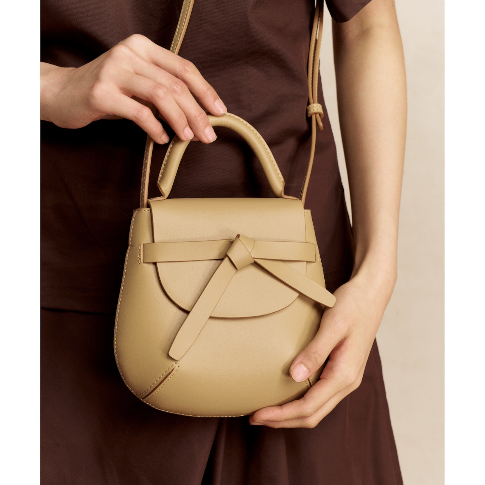 The Yellow Shop Beth Knotted Small Saddle Bag in Cream Apricot | MADAX