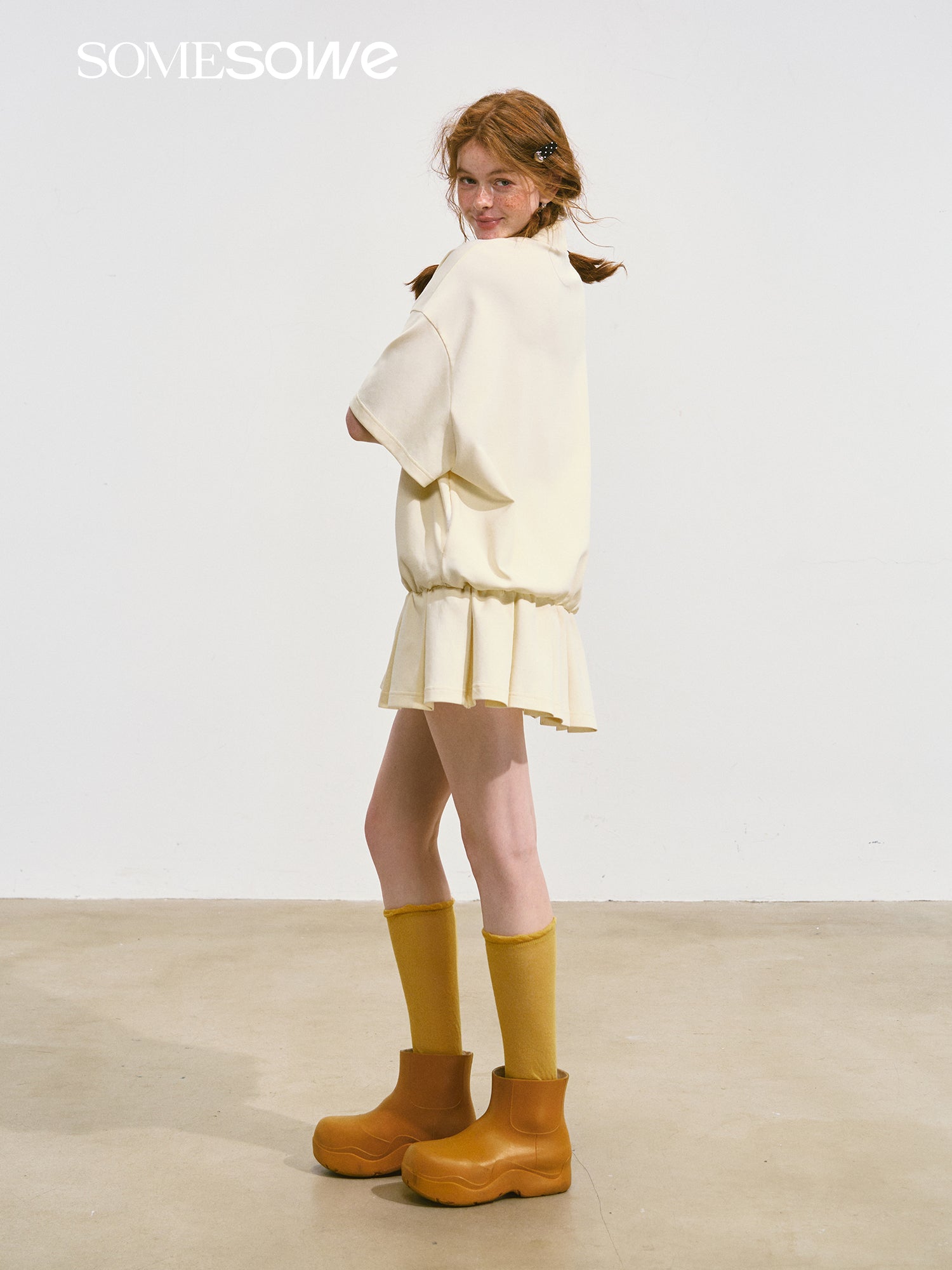 SOMESOWE Bow Pleated Dress In Beige | MADAX