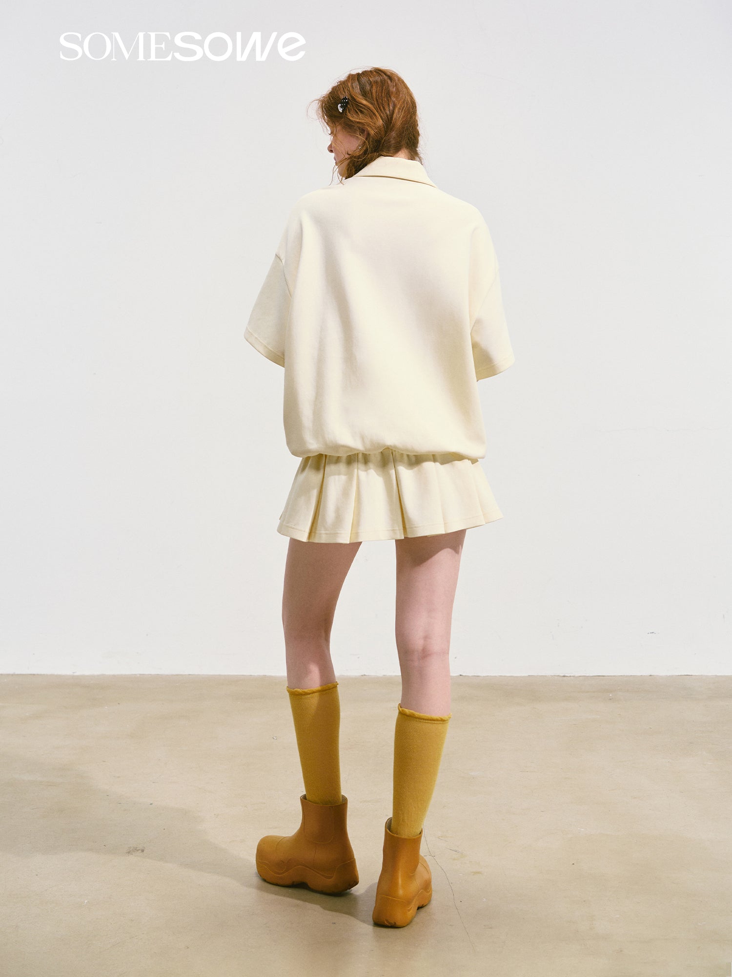 SOMESOWE Bow Pleated Dress In Beige | MADAX