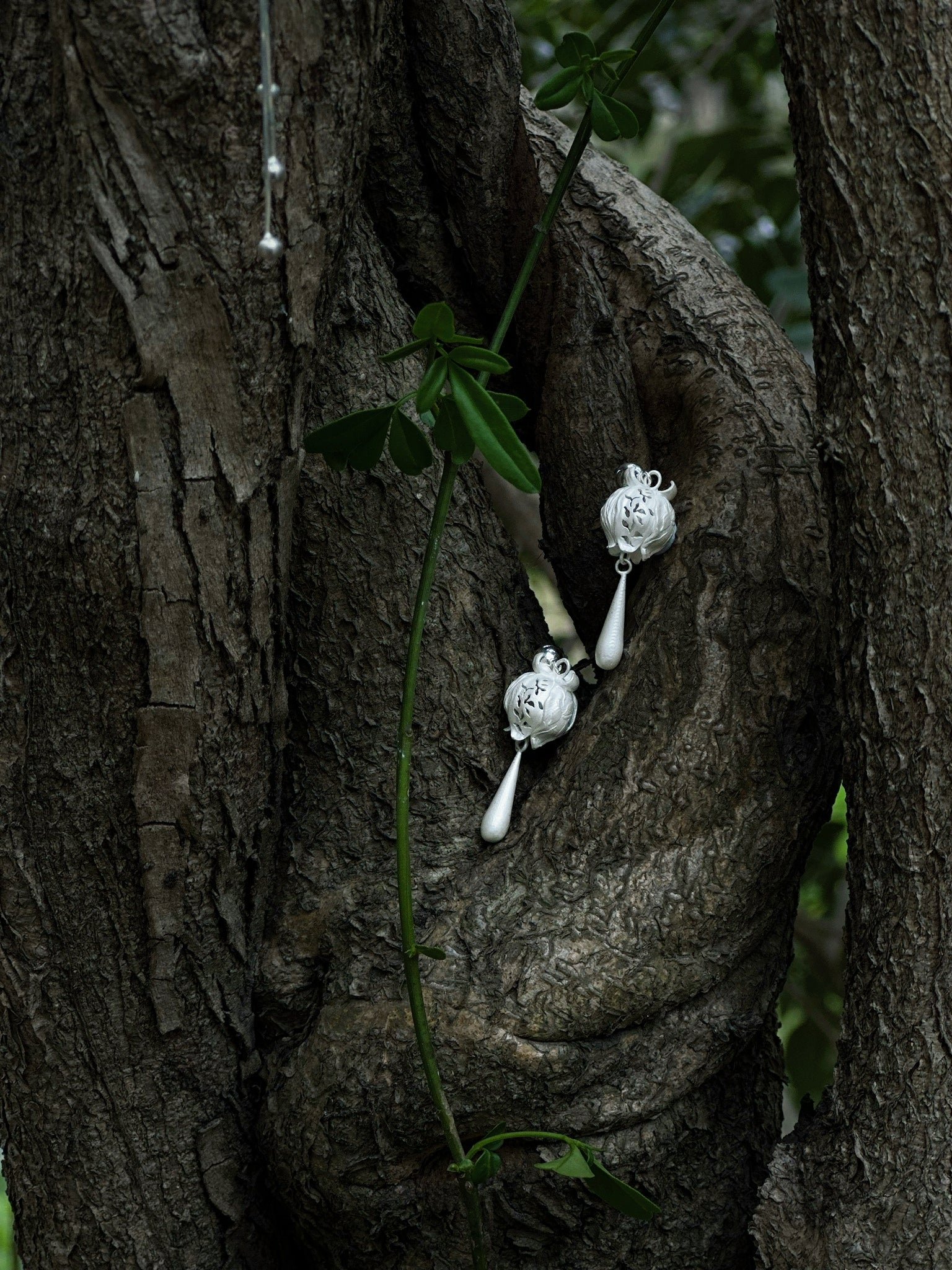 CHENG Burnt White Sculpted Drop Pod Earrings | MADA IN CHINA