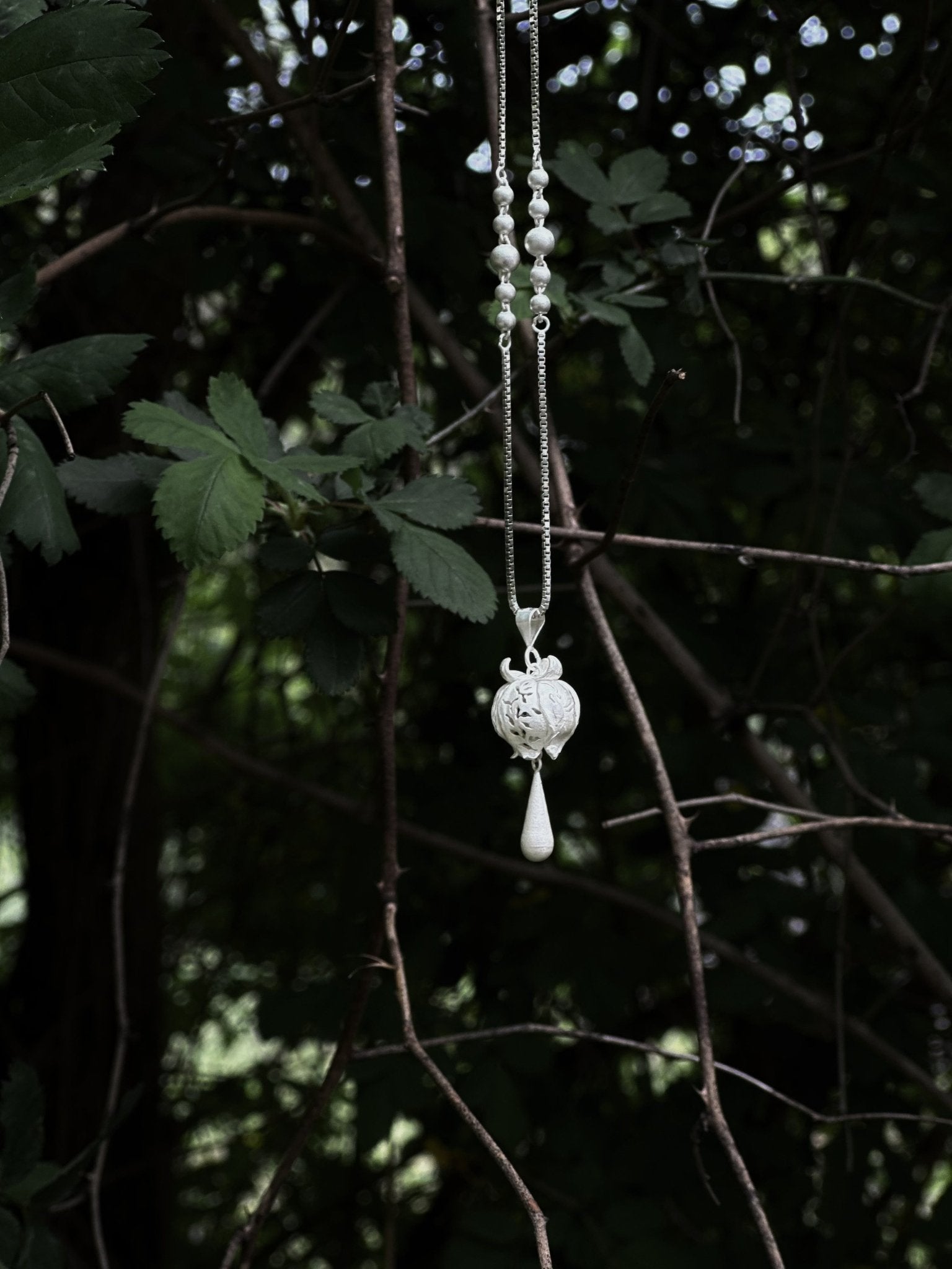 CHENG Burnt White Sculpted Drop Pod Necklace | MADA IN CHINA