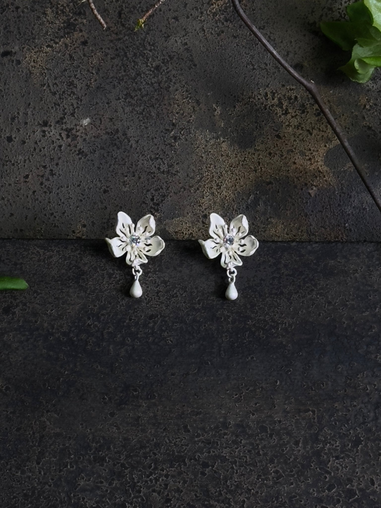 CHENG Burnt White Skeletonized Dewy Peach Blossom Earrings | MADA IN CHINA