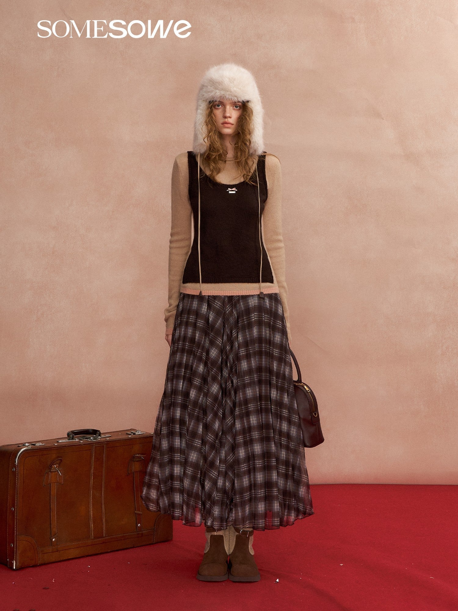 SOMESOWE Color - blocked Vest Layered Over A Long - sleeved Sweater In Brown | MADAX