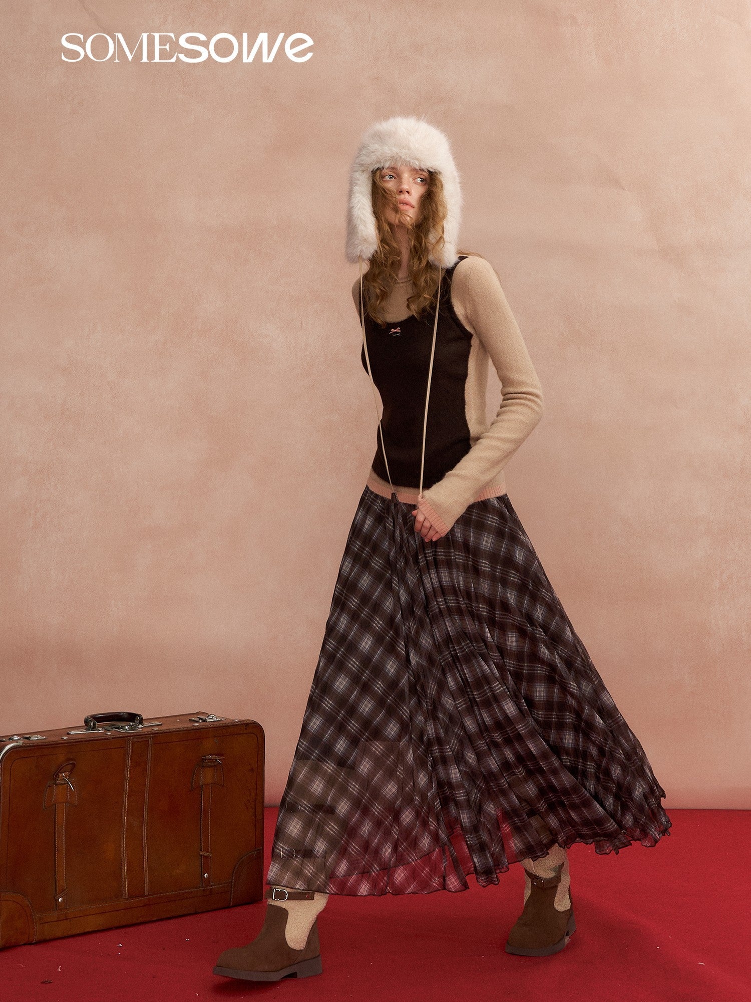 SOMESOWE Color - blocked Vest Layered Over A Long - sleeved Sweater In Brown | MADAX