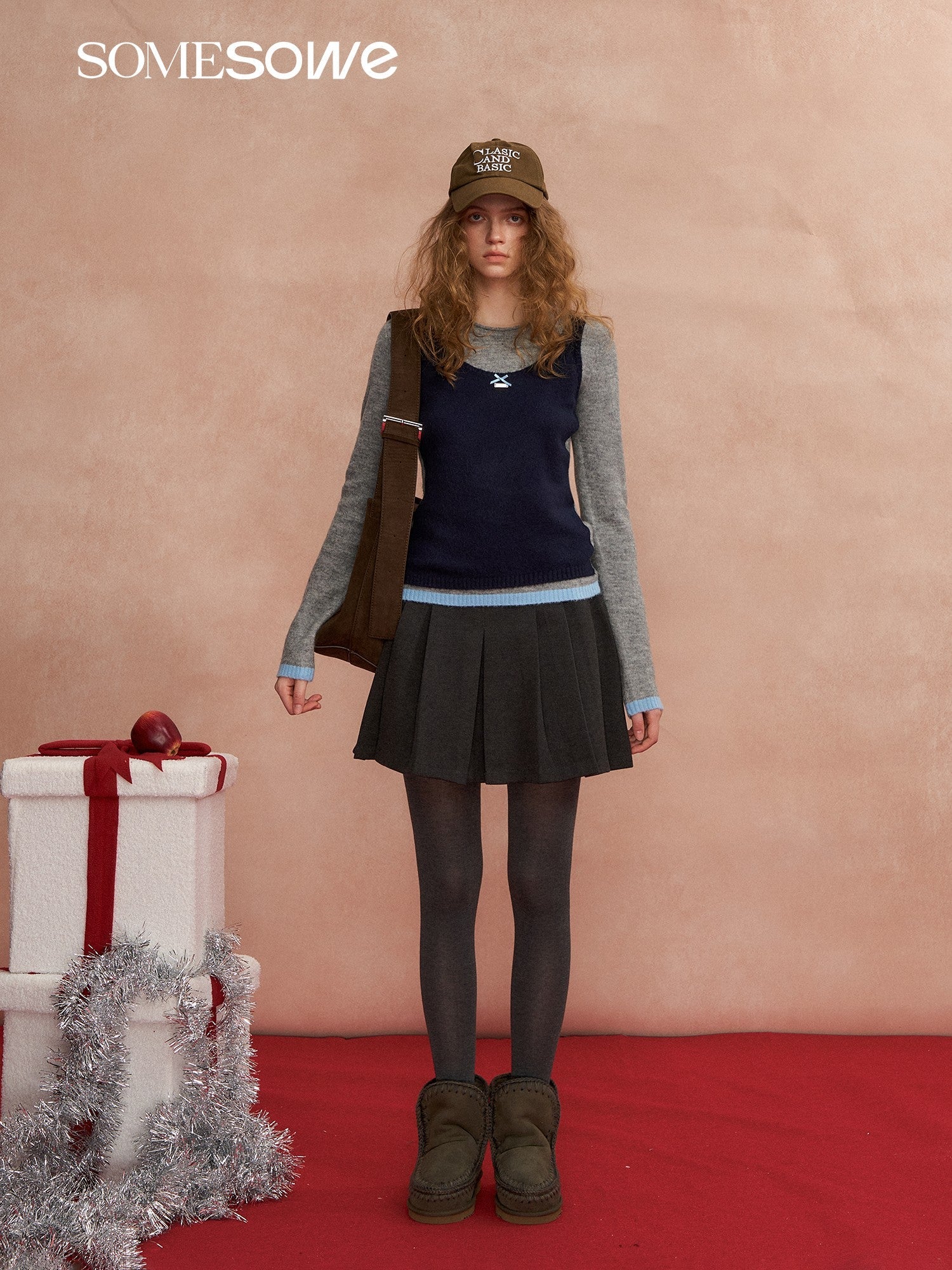 SOMESOWE Color - blocked Vest Layered Over A Long - sleeved Sweater In Gray | MADAX