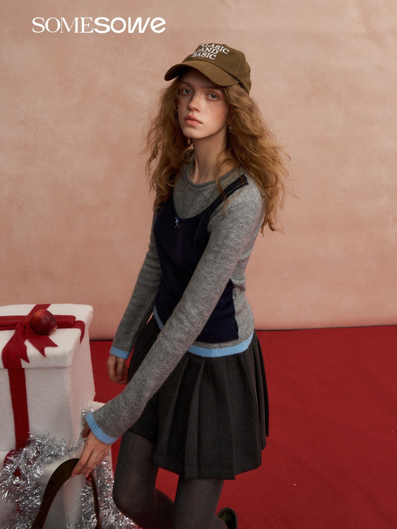 SOMESOWE Color - blocked Vest Layered Over A Long - sleeved Sweater In Gray | MADAX