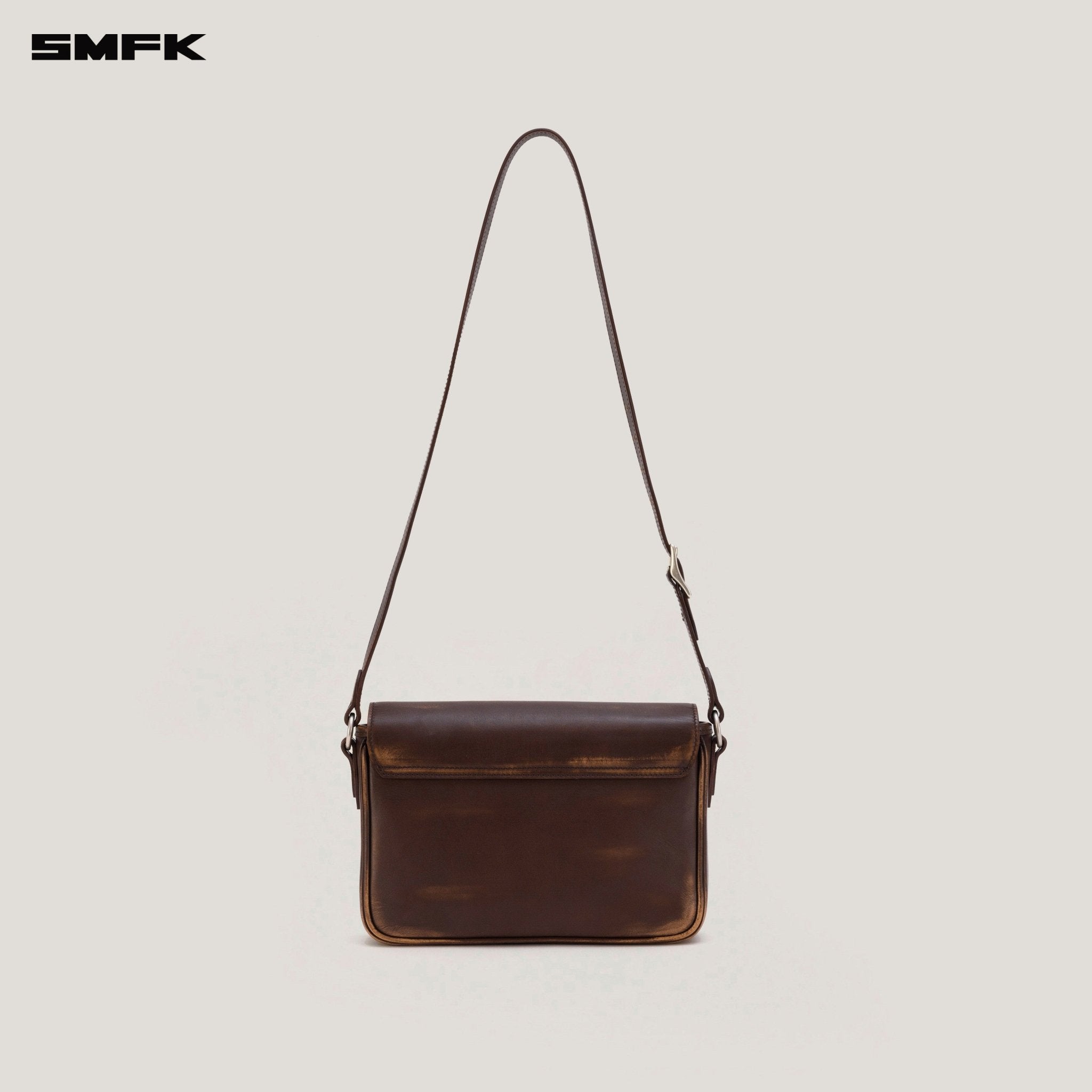 SMFK Compass Badge Patina Leather Flip Bag In Brown (Medium) | MADAX