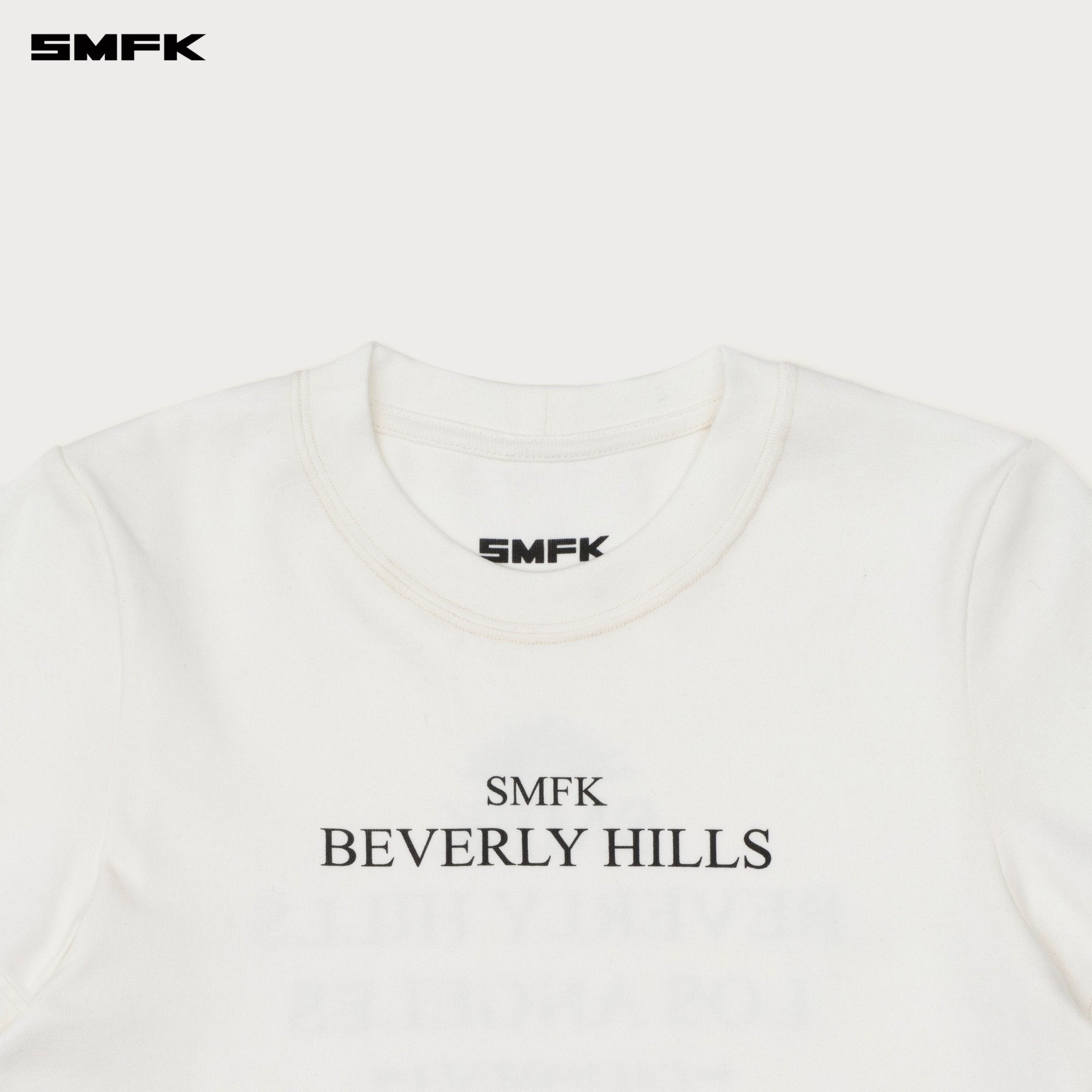 SMFK Compass Beverly Movie Subtitles Crop Tee In White | MADAX