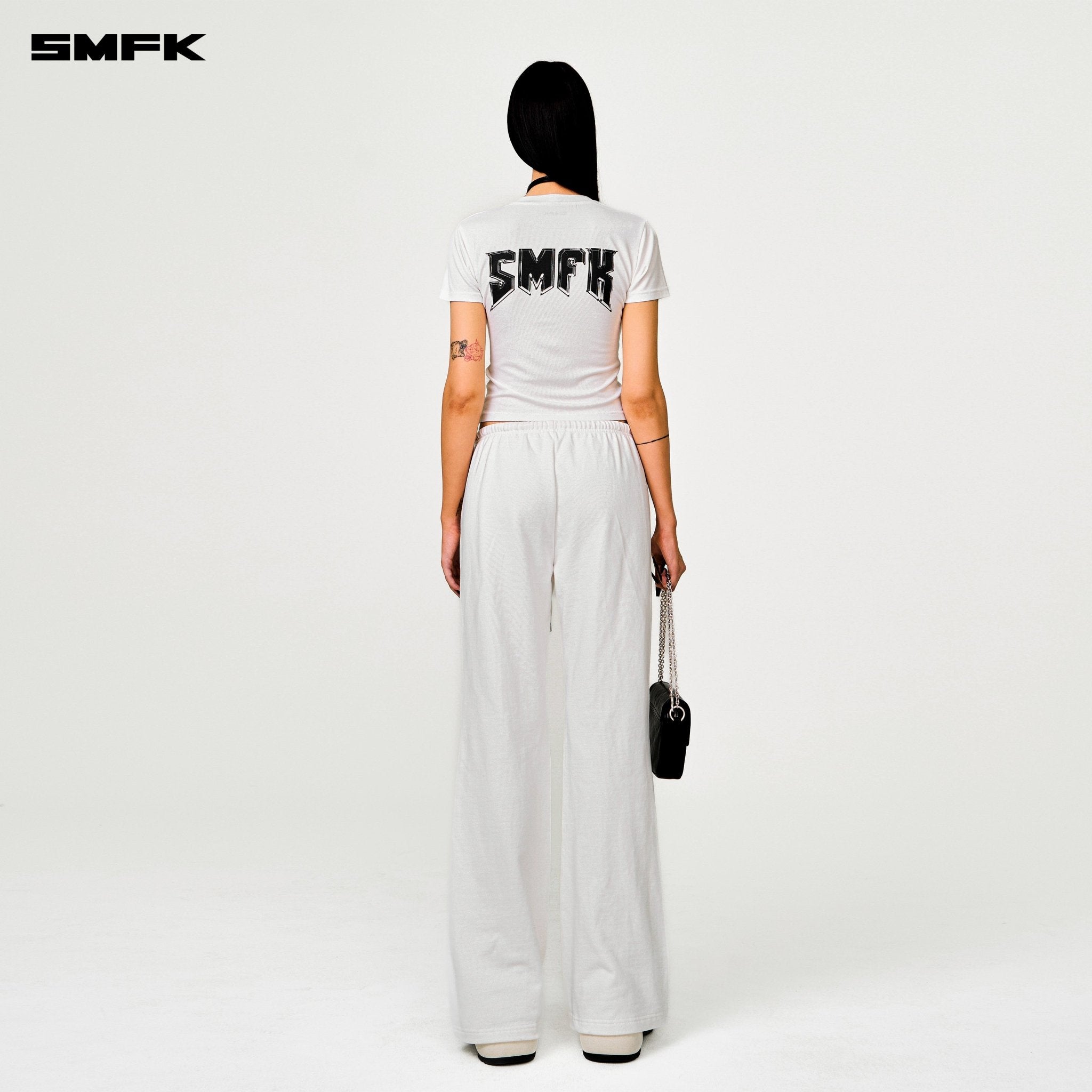 SMFK Compass Cross Classic Flared Track Pants In White | MADAX