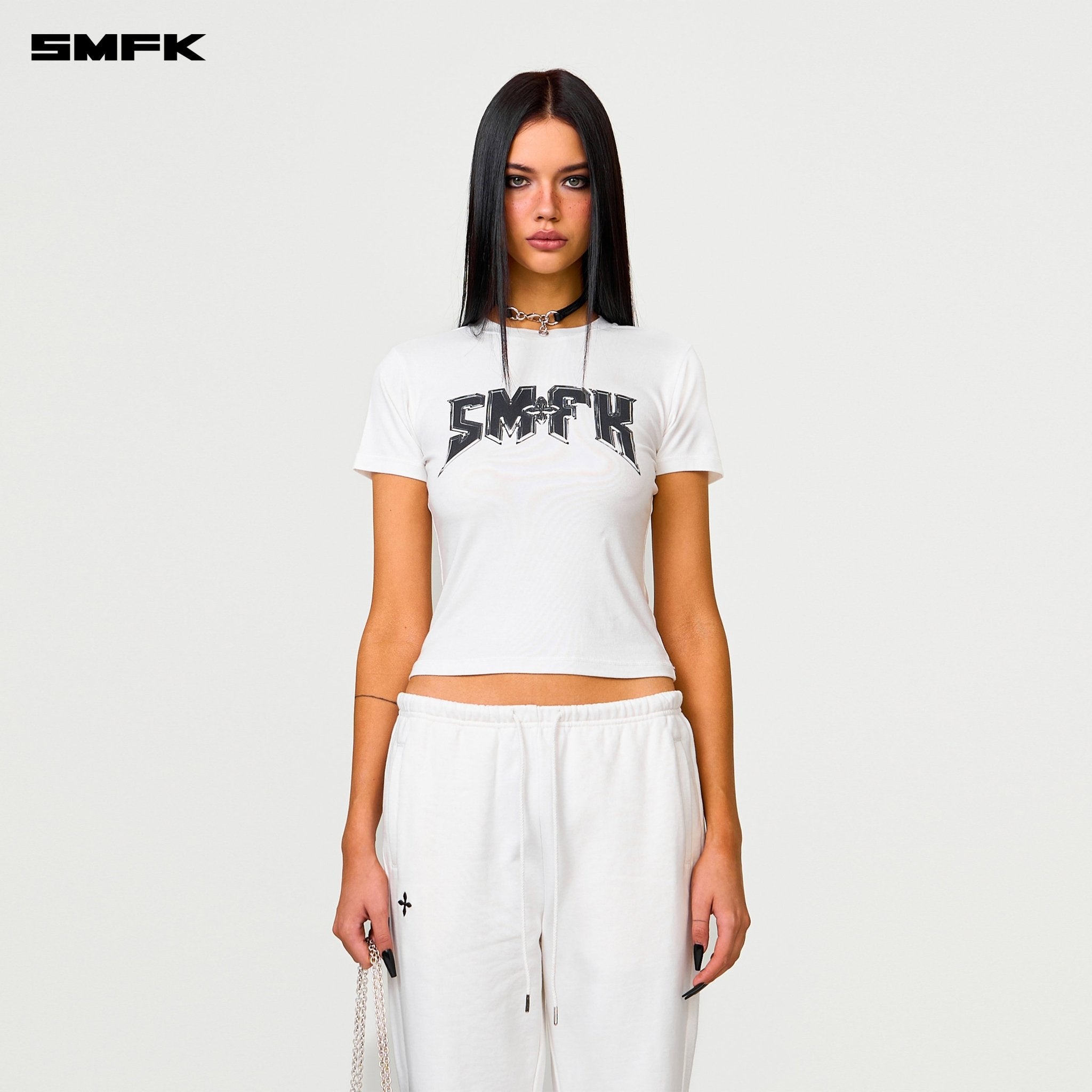 SMFK Compass Cross Classic Flared Track Pants In White | MADAX