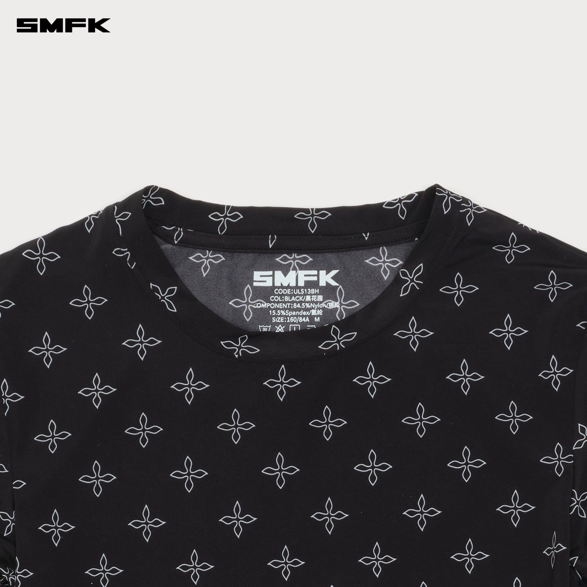 SMFK Compass Hug Hand - Painted Garden Slim Top In Black | MADAX