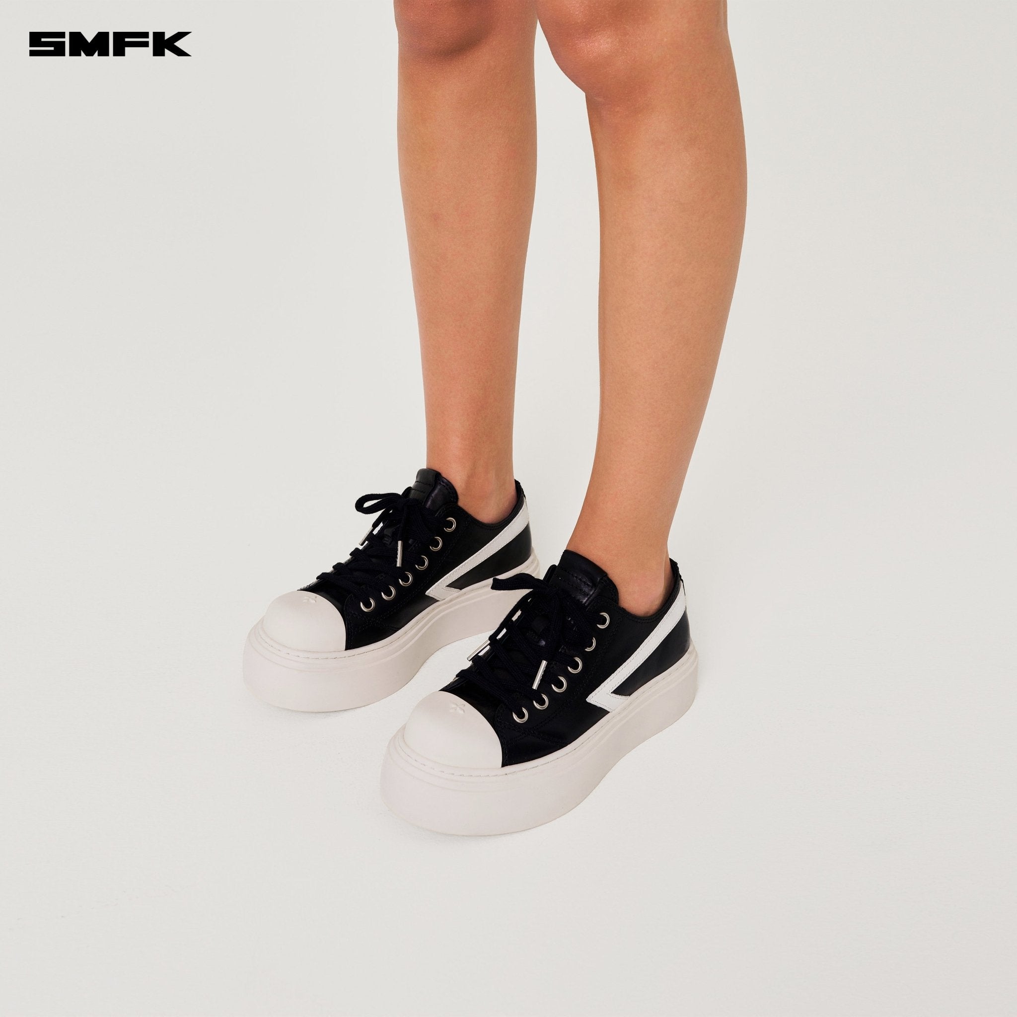 SMFK Compass Meteor Rove Lop - Top Sneaker In Black And White | MADAX