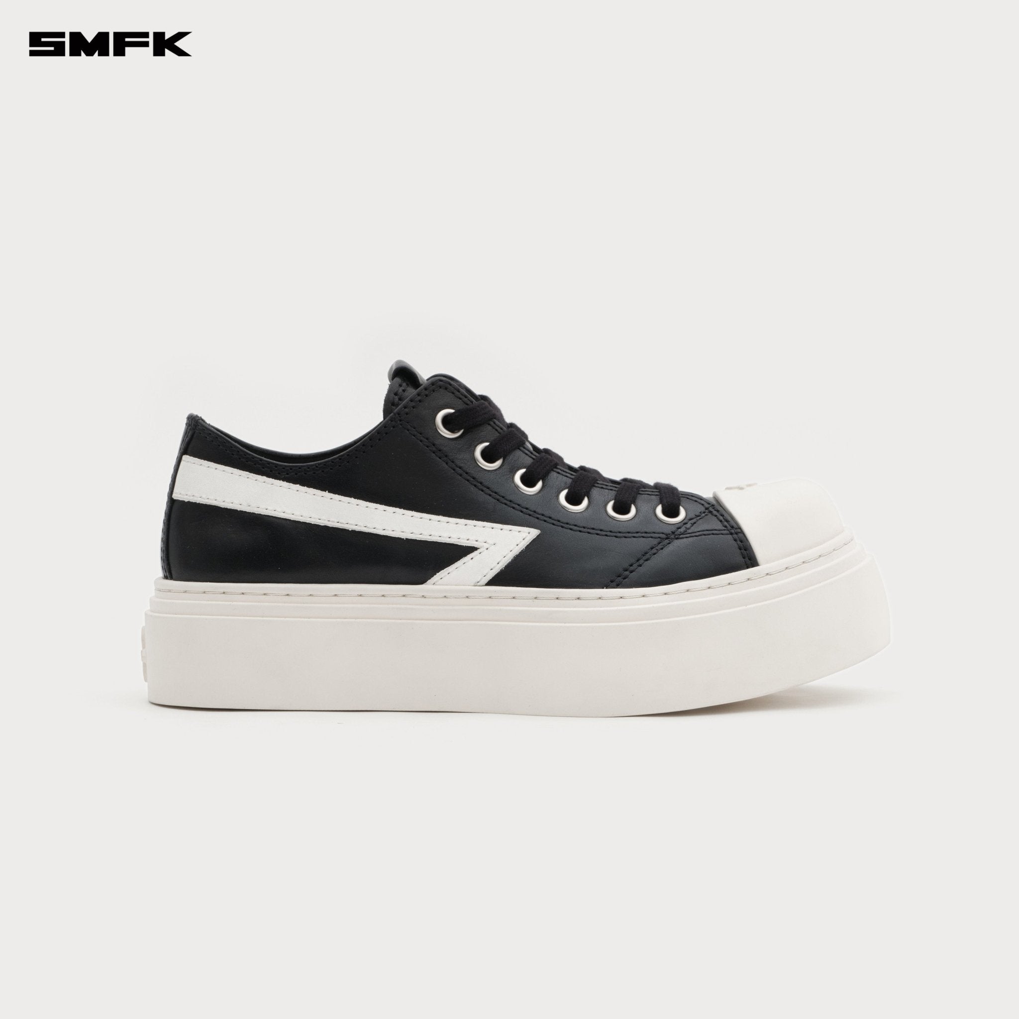 SMFK Compass Meteor Rove Lop - Top Sneaker In Black And White | MADAX