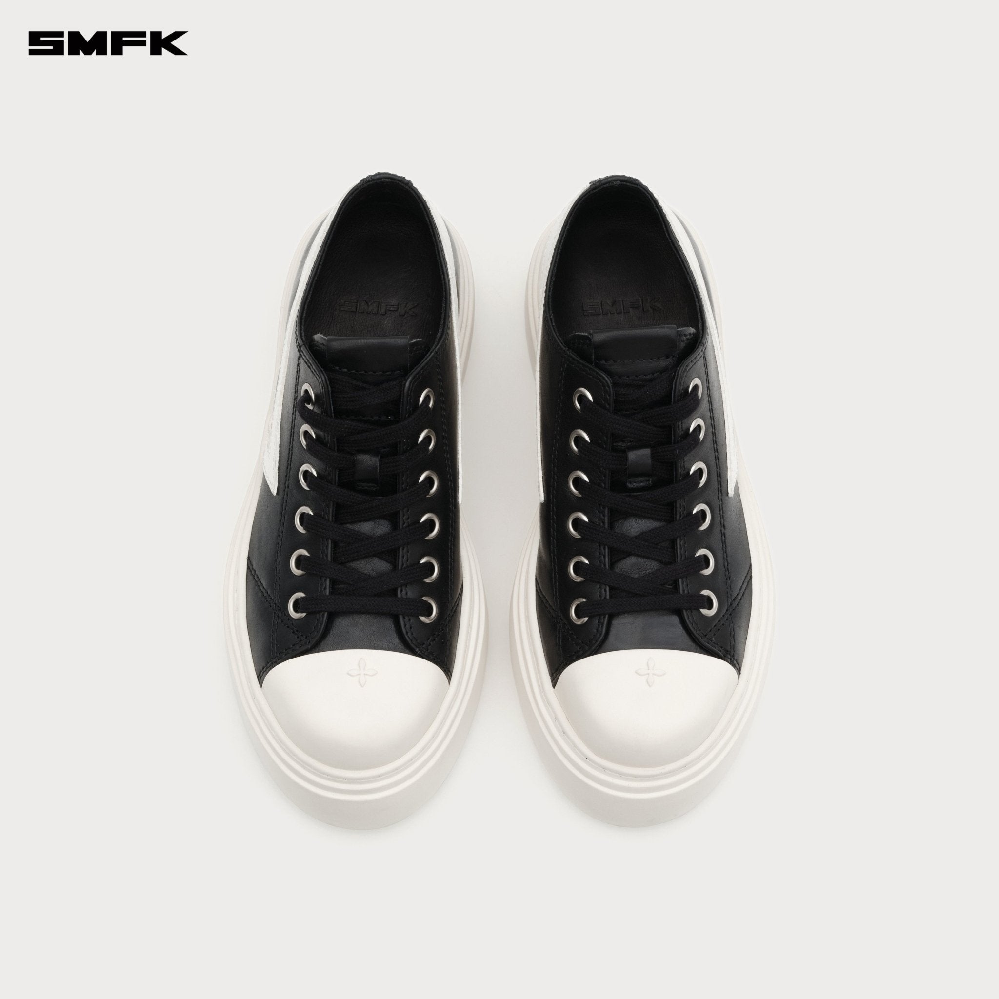 SMFK Compass Meteor Rove Lop - Top Sneaker In Black And White | MADAX