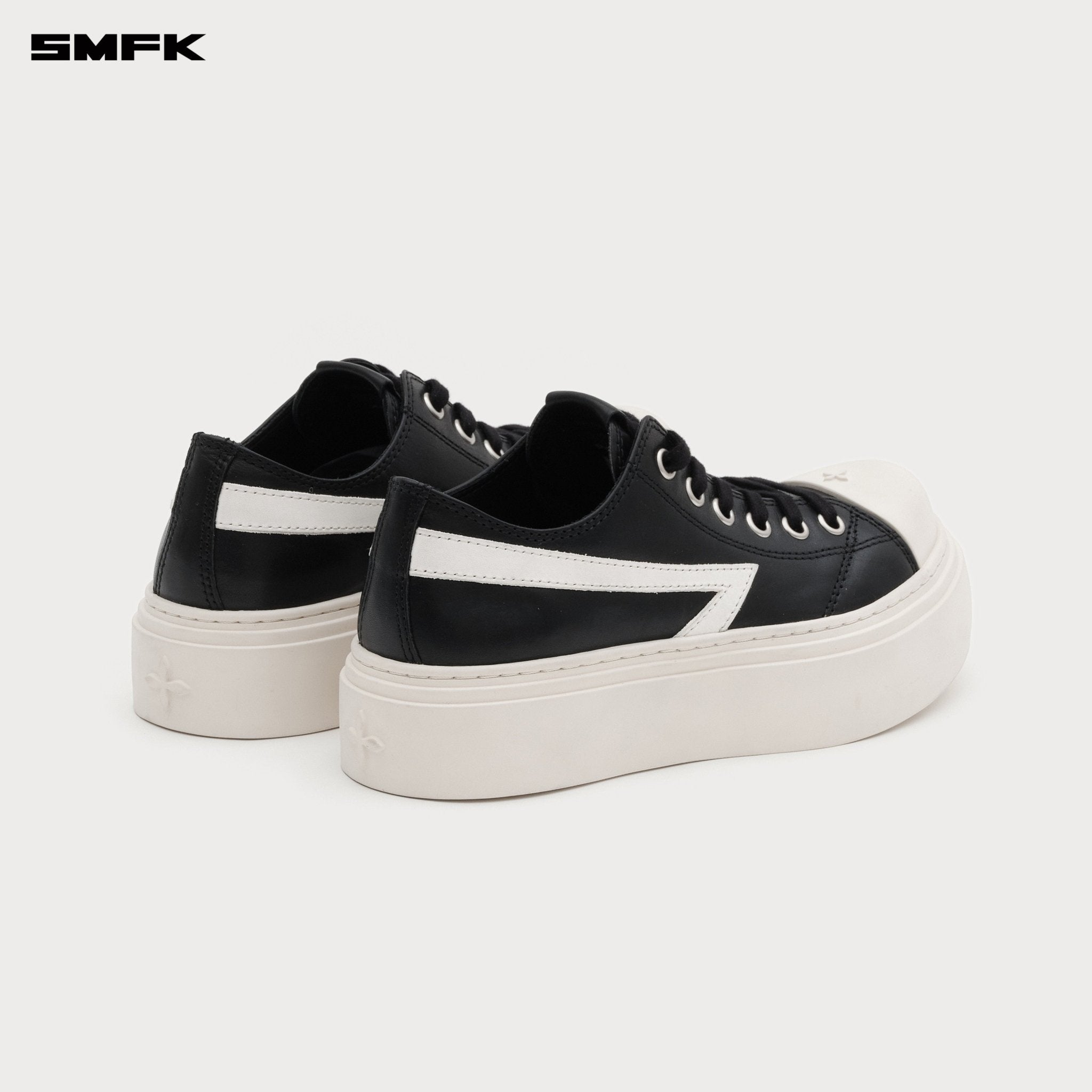 SMFK Compass Meteor Rove Lop - Top Sneaker In Black And White | MADAX