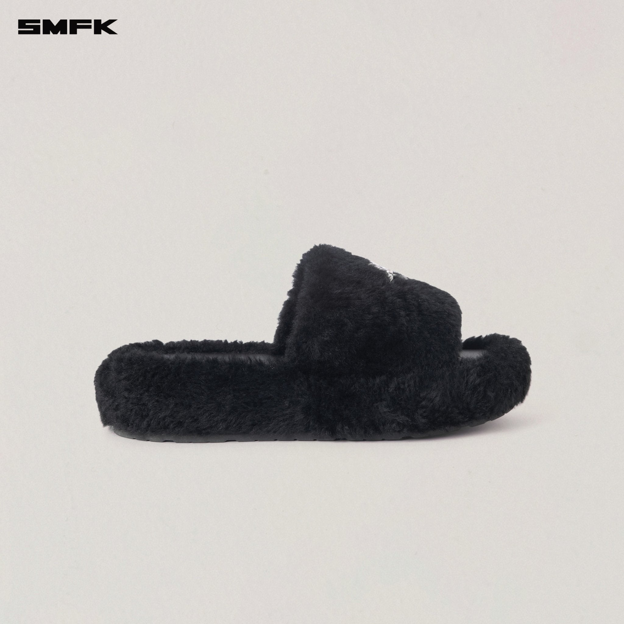 SMFK Compass Mode Unity Shearling Slipper in Wild Black | MADAX