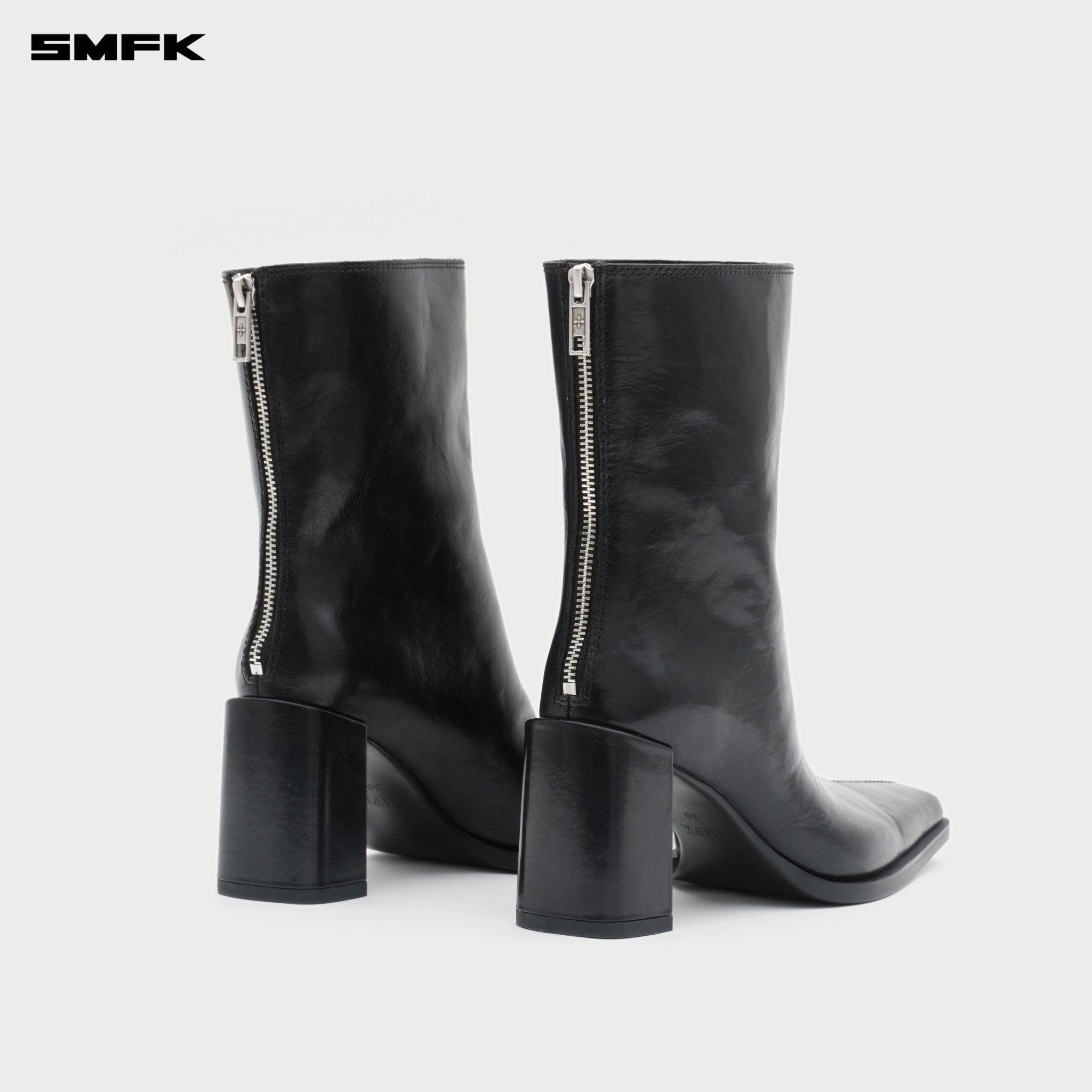 SMFK Compass Stage Leather High - heeled Boots In Black | MADAX