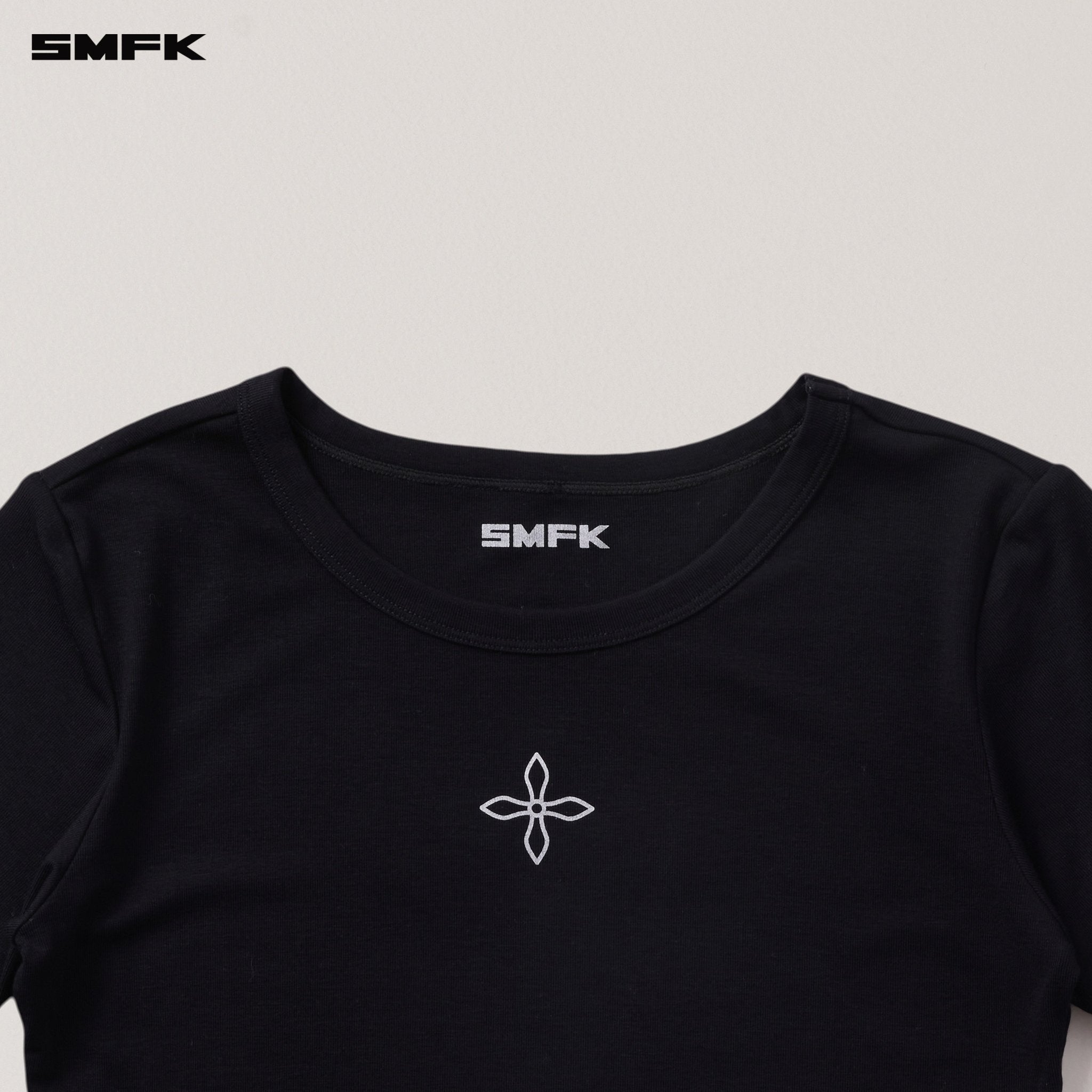SMFK Compass Stamp Acetate Body Sports Tee In Wild Black | MADAX
