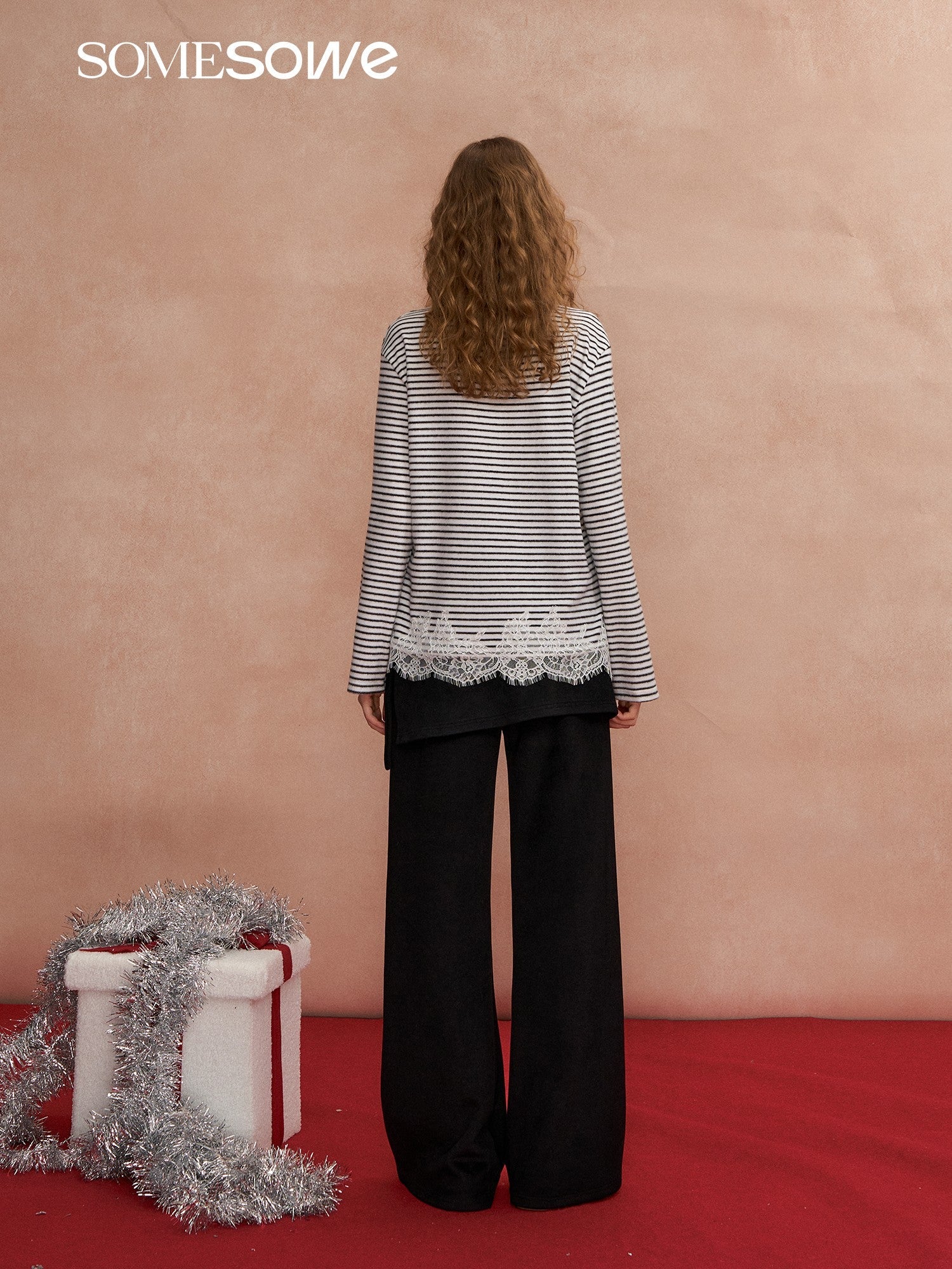 SOMESOWE Detachable Flared Wool Trousers in Black | MADAX