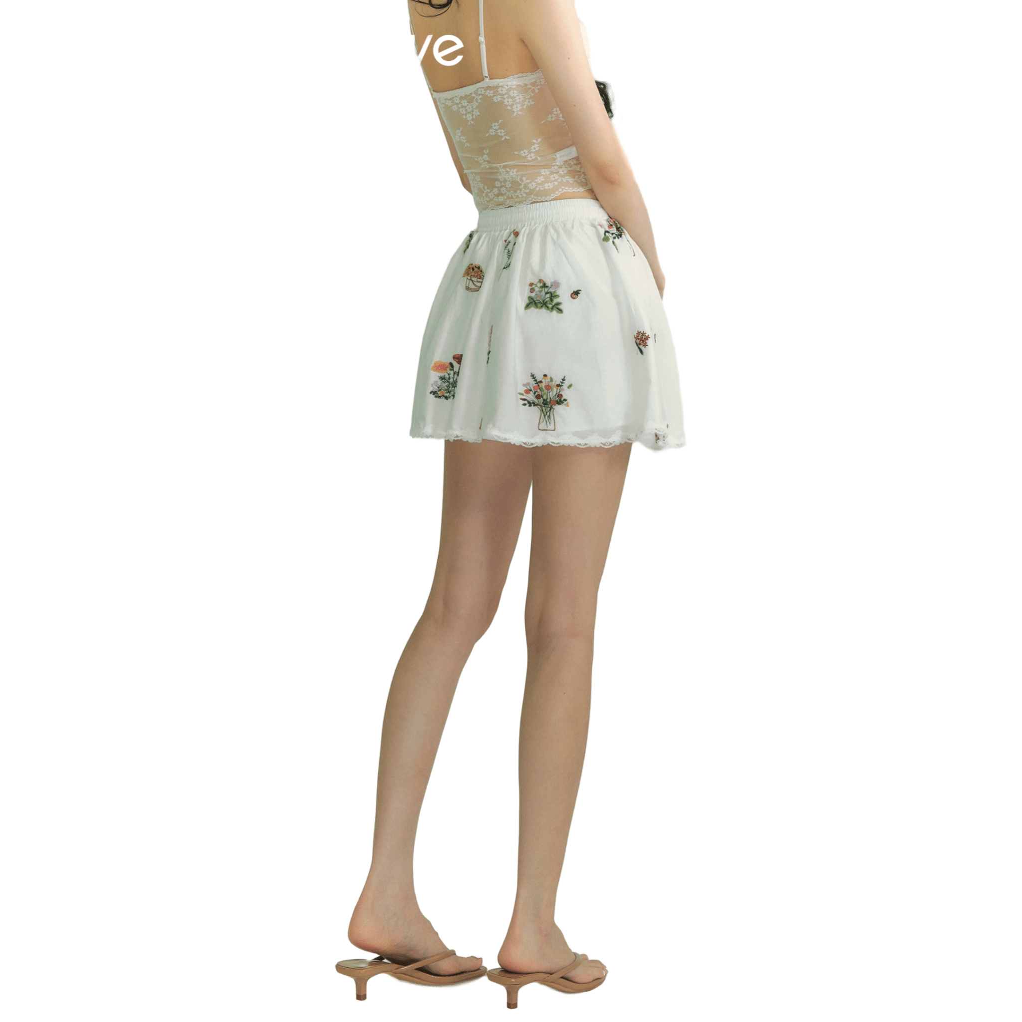 SOMESOWE Floral Embroidered Lace Patchwork Short Skirt in White | MADAX