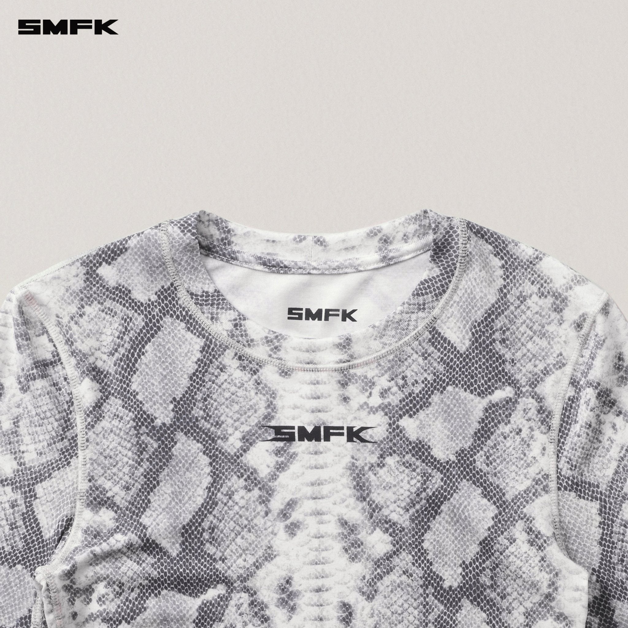 SMFK Future Mirage Sports Top In White Serpent | MADAX