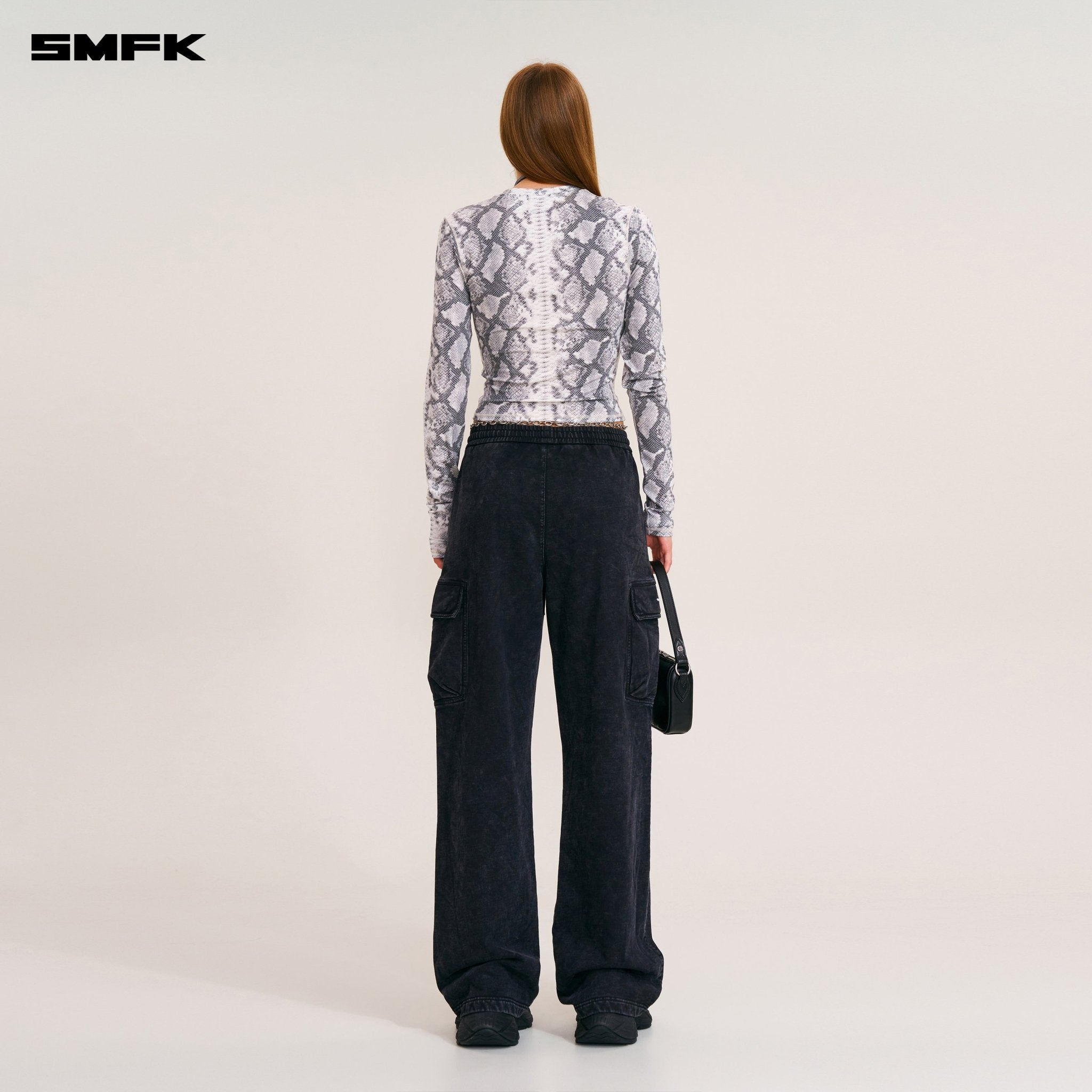 SMFK Future Mirage Sports Top In White Serpent | MADAX