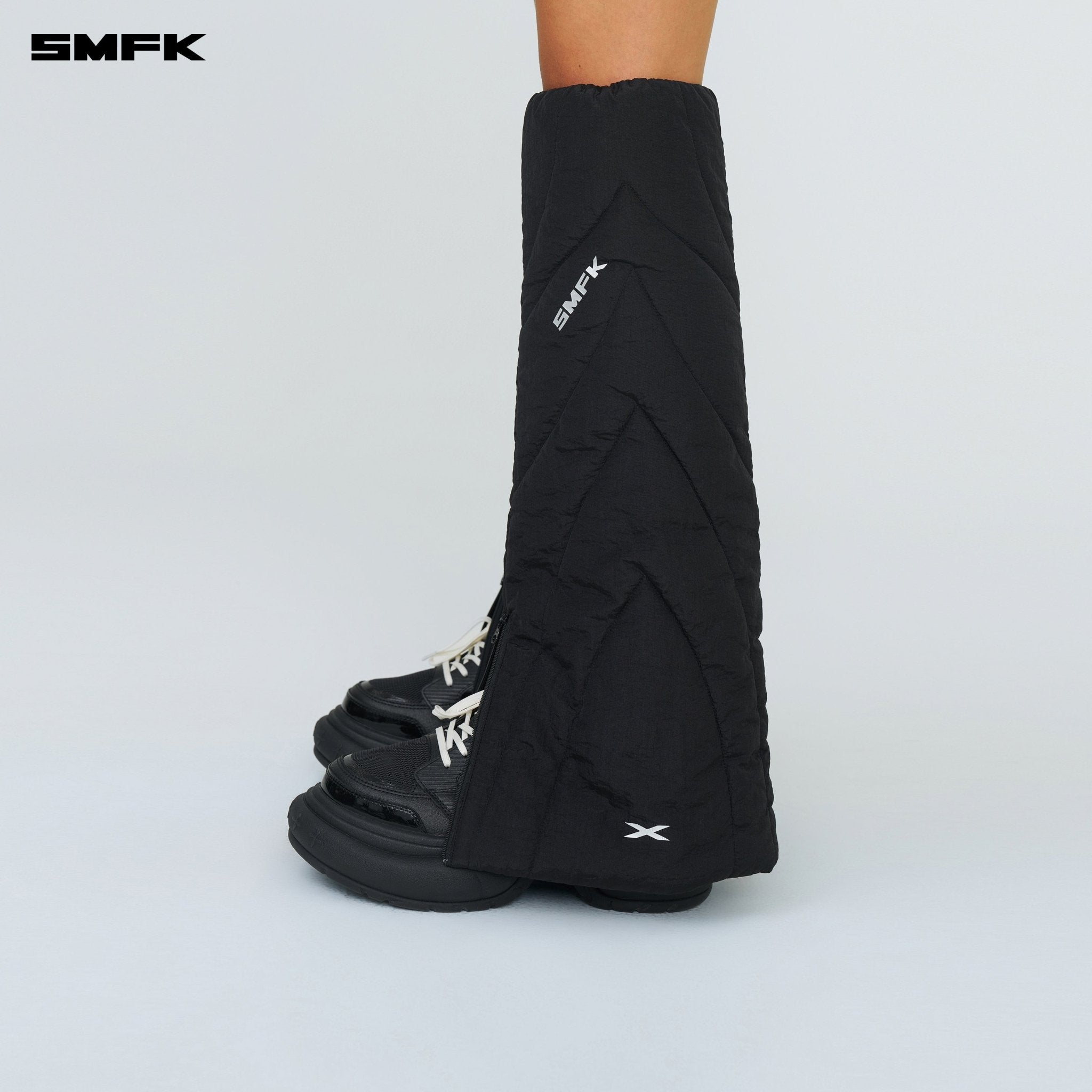 SMFK FUTURE Storm Leg Warmer In Black | MADAX