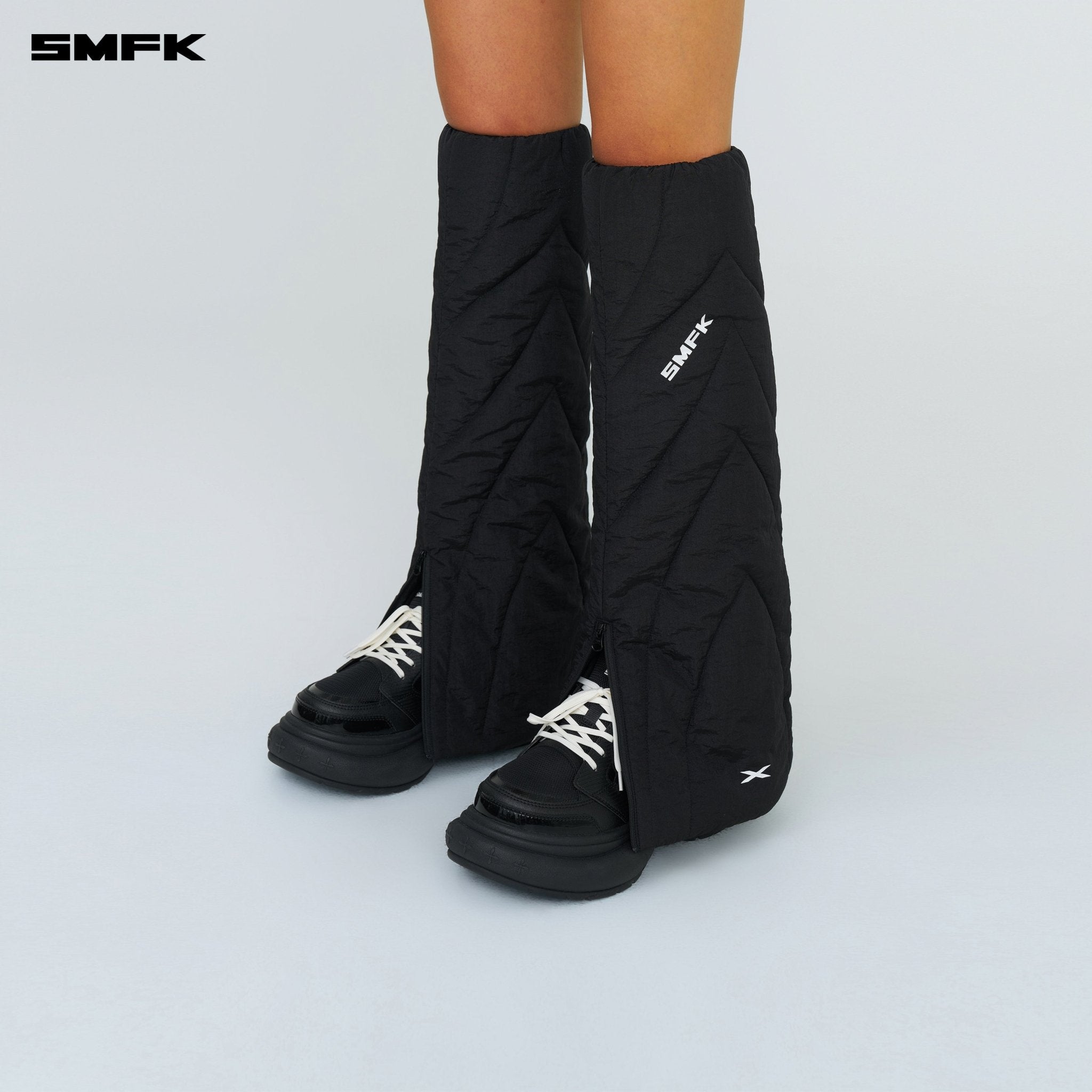 SMFK FUTURE Storm Leg Warmer In Black | MADAX