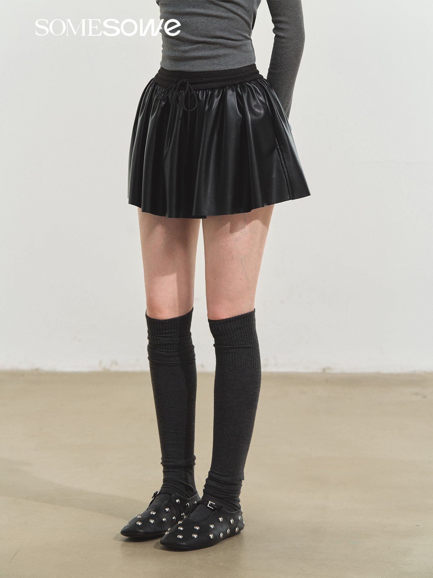 SOMESOWE Puffy Leather Skirt In Black | MADAX