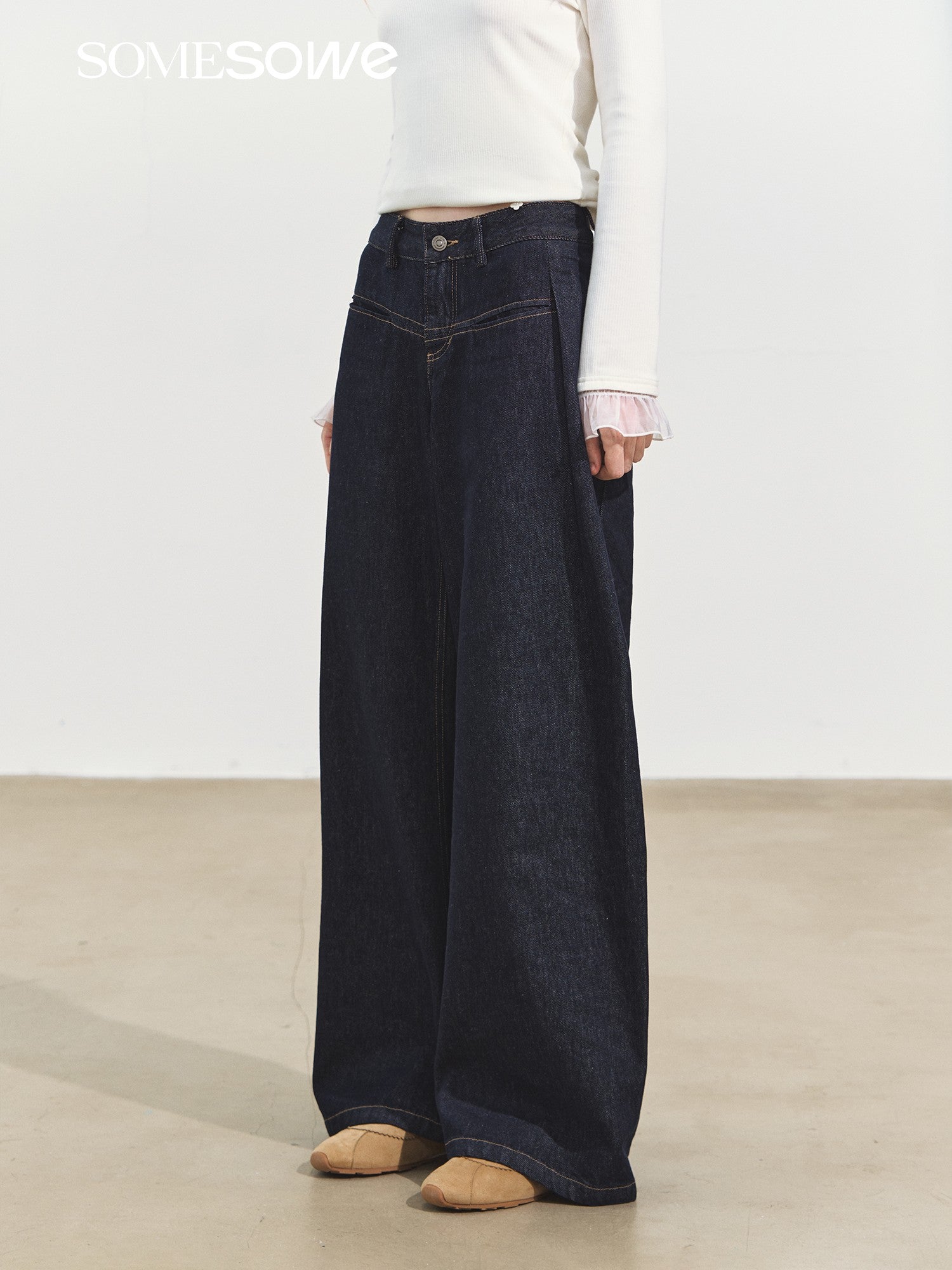 SOMESOWE Raw Denim Pleated Banana Pants In Dark Blue | MADAX