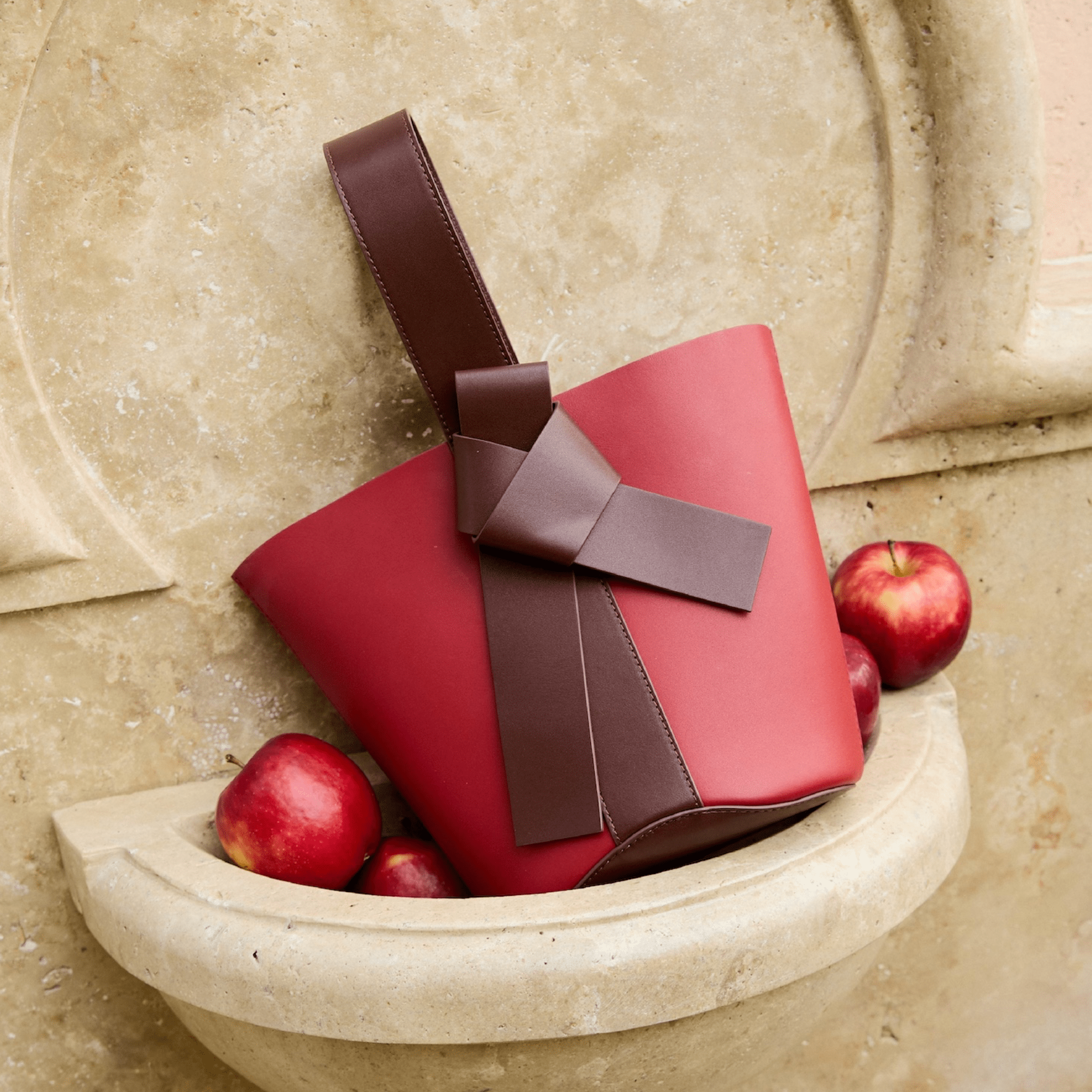 The Yellow Shop Siena Knot Bucket Bag in Burgundy Red | MADAX