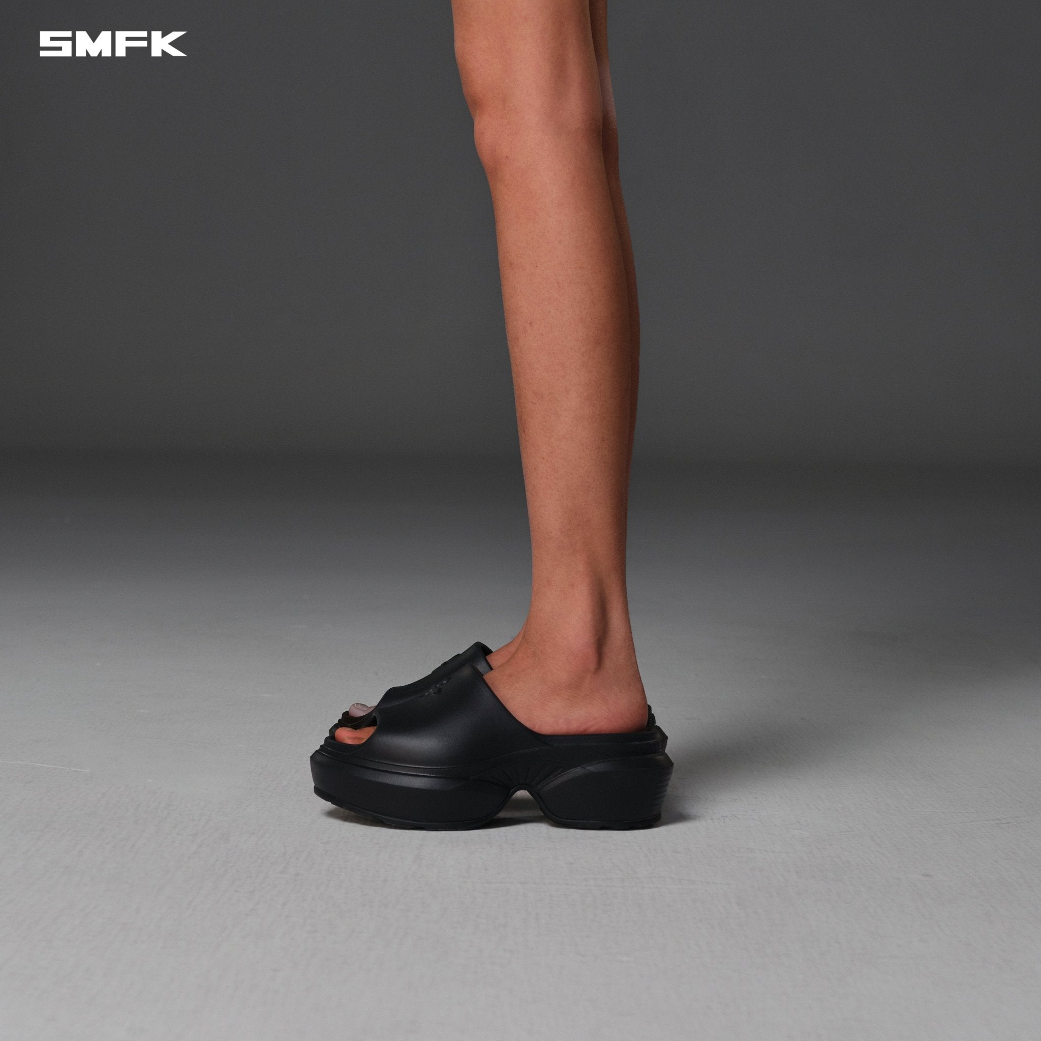 SMFK Wave Slipper In Wild Black | MADAX