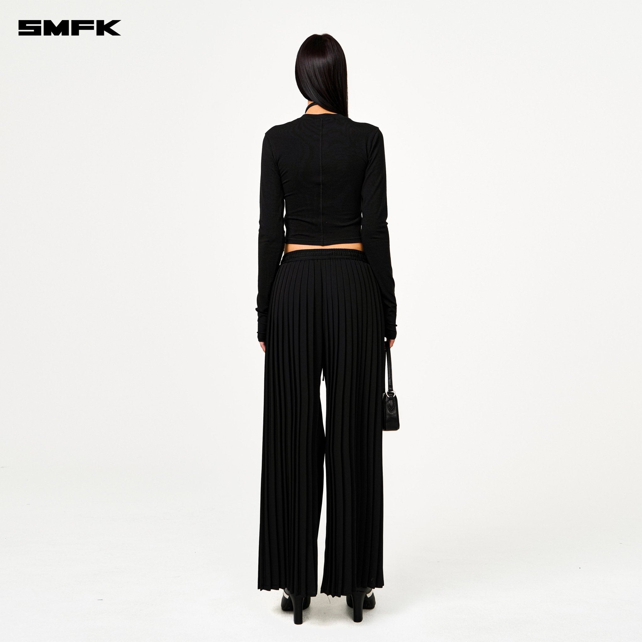 SMFK Wild World Pleated Trousers In Black | MADAX